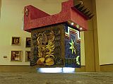 Ecuador Quito Guayasamin 1-14 Capilla del Hombre In the lower level of the Capilla del Hombre is a large box-like structure with a red U-shape on top.